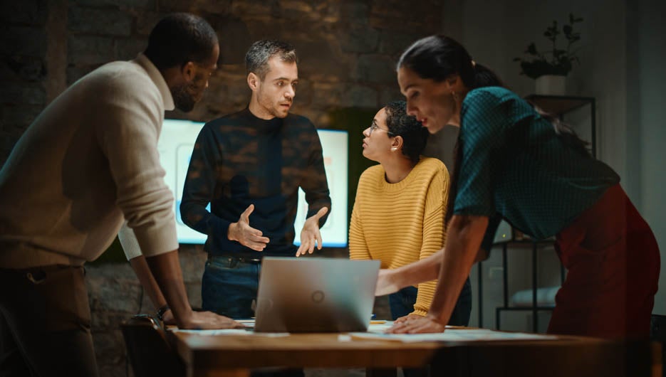 Diverse Multiethnic Team are Having a Conversation in a Meeting 